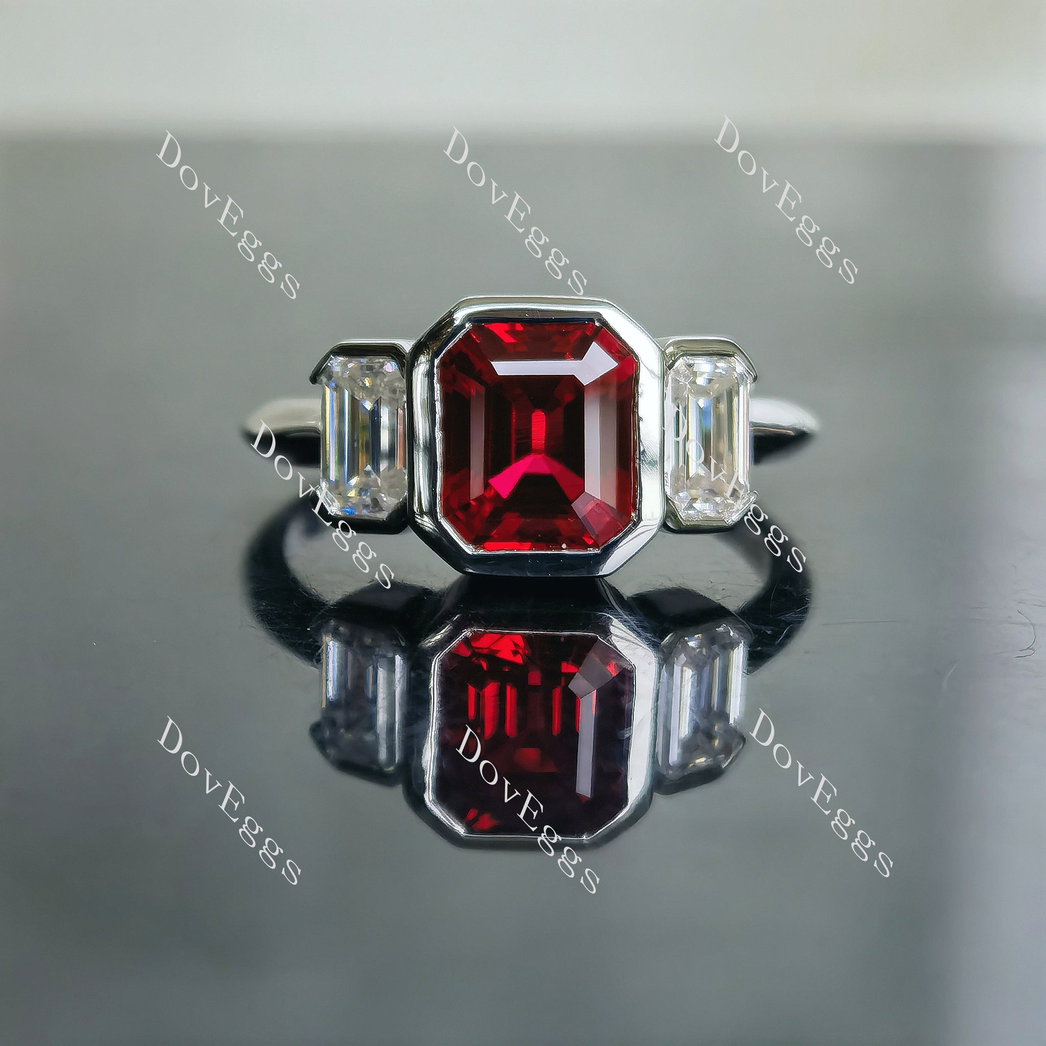 Doveggs Elizabeth Taylor Krupp cut three stone bezel colored gem engagement ring