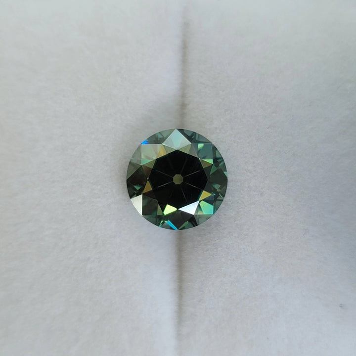 DovEggs round OMC light black green moissanite loose stone