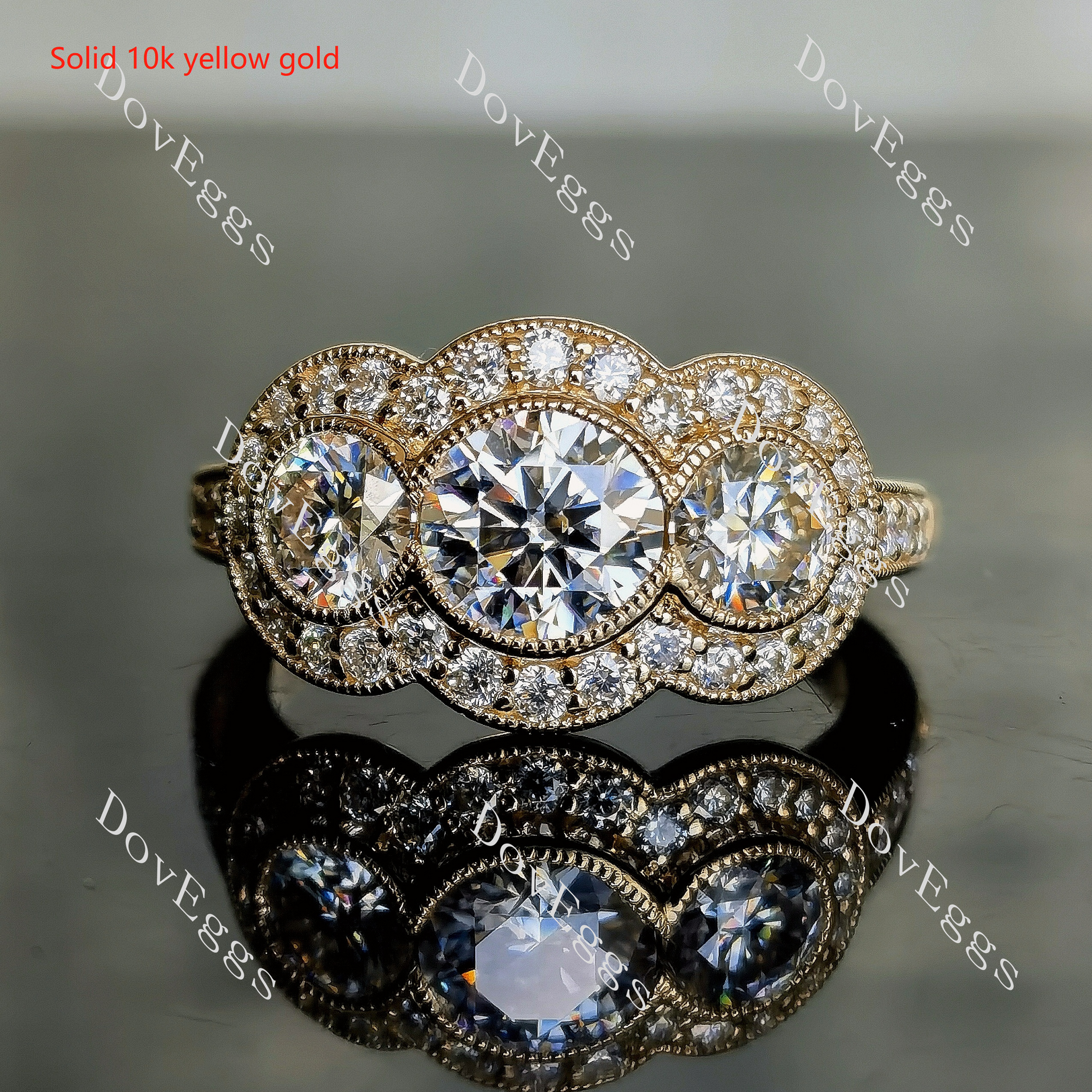 Doveggs three-stone halo pave moissanite engagement ring