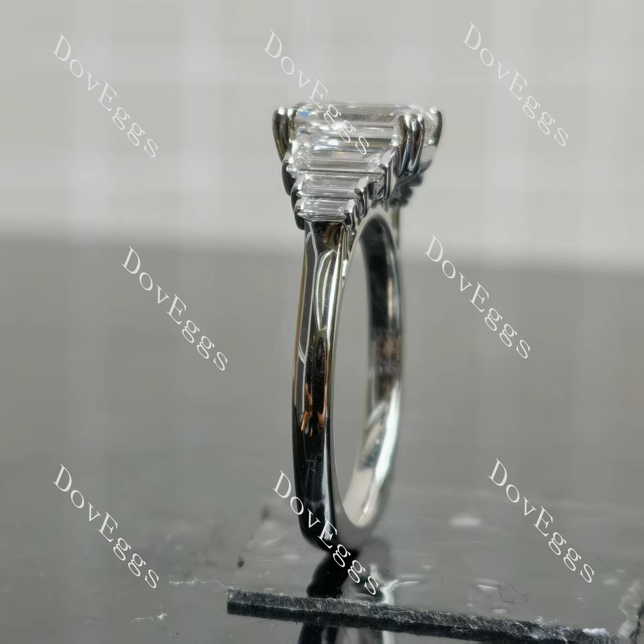Doveggs emerald side stones moissanite engagement ring