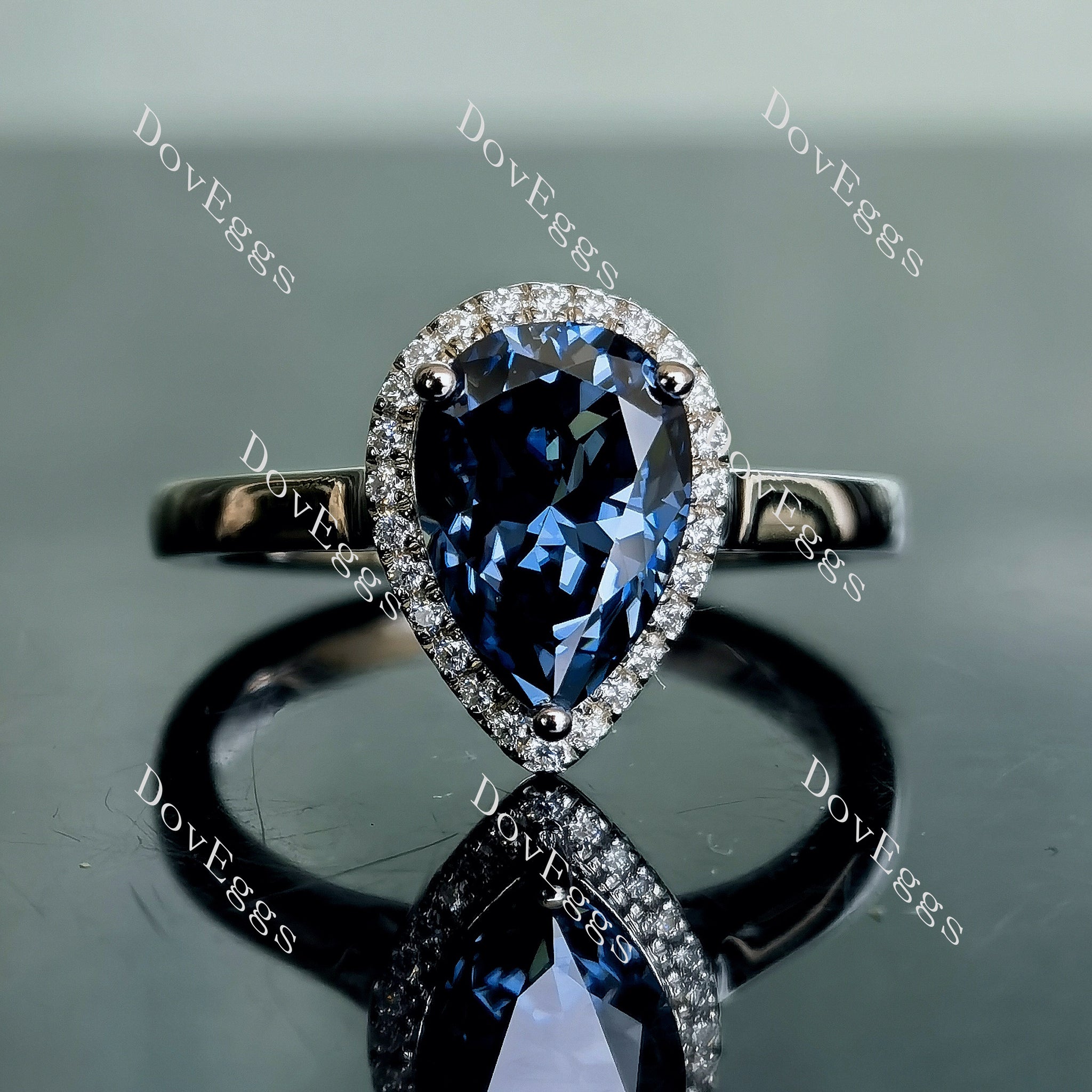 Doveggs pear cathedral halo twilight blue moissanite engagement ring