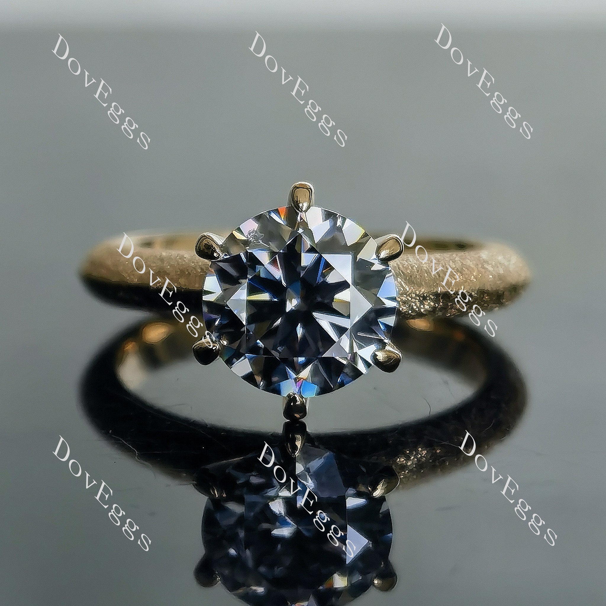 The classic 6 prongs textured solitaire moissanite ring