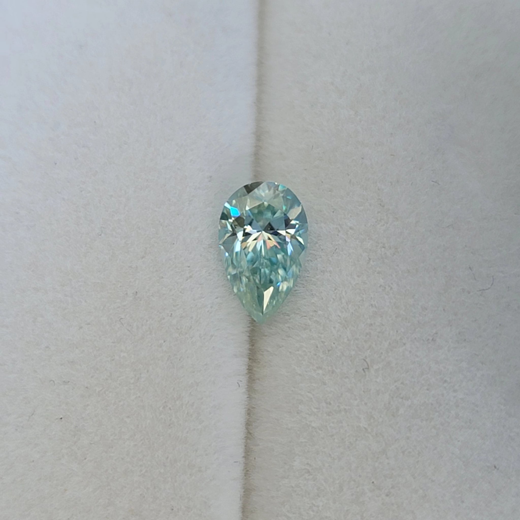 Doveggs pear 1.25ct accident color light blue moissanite loose stone