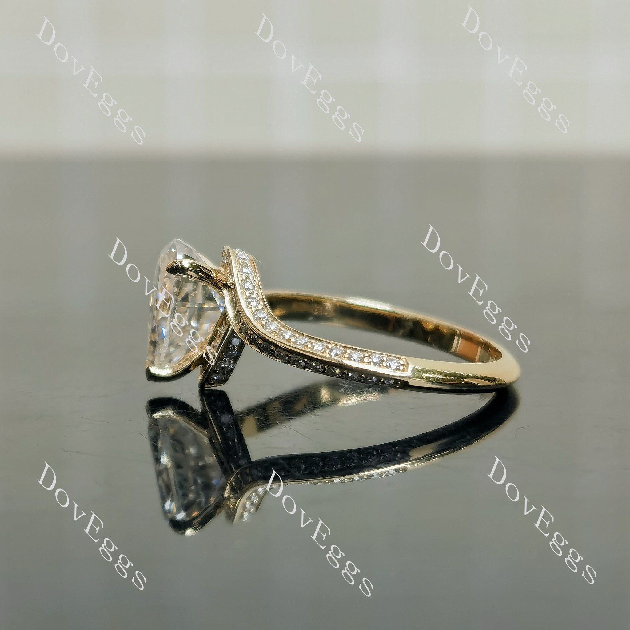 Stephanie’s Promise pear pave channel moissanite engagement ring