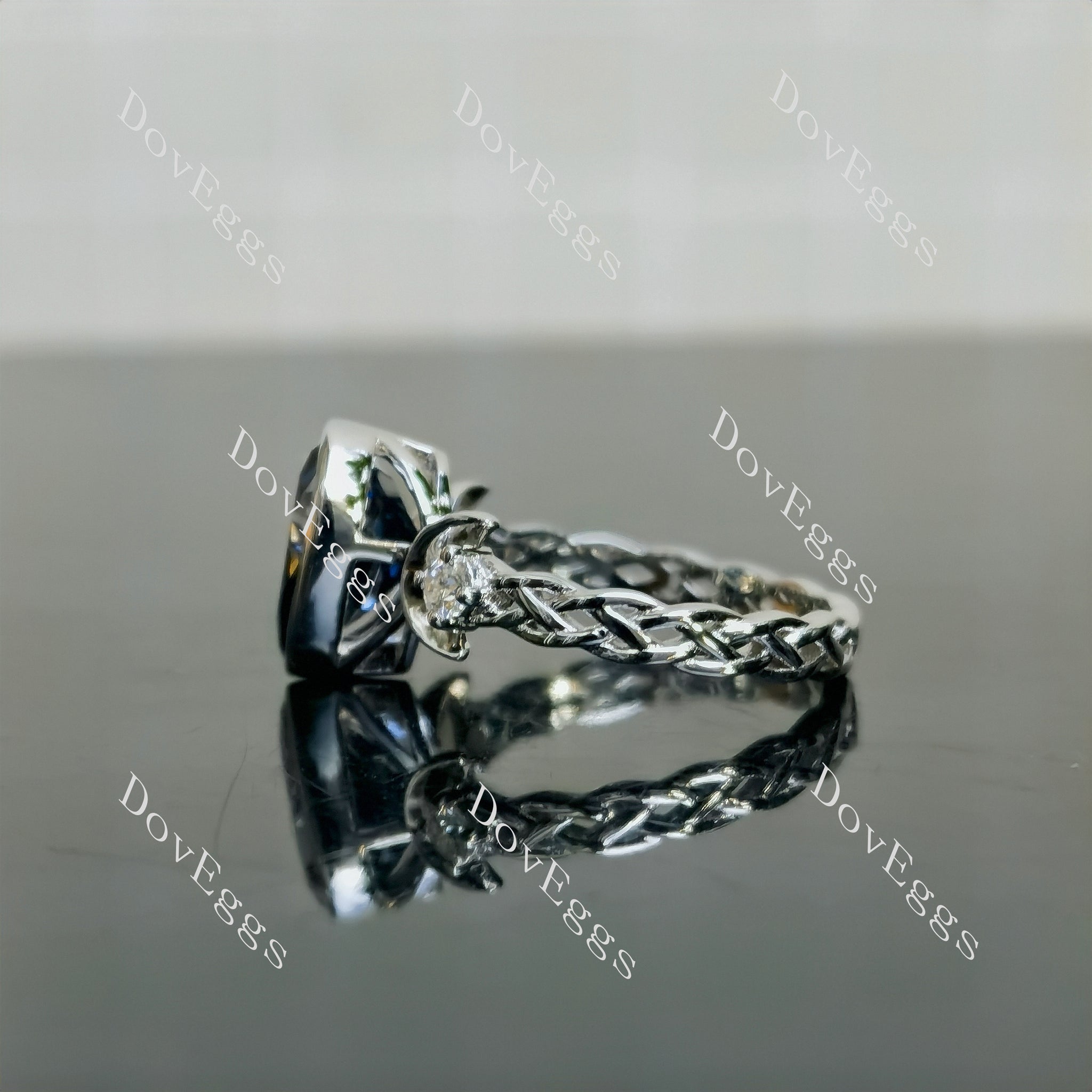Doveggs pear twilight blue half moon three-stone moissanite engagement ring