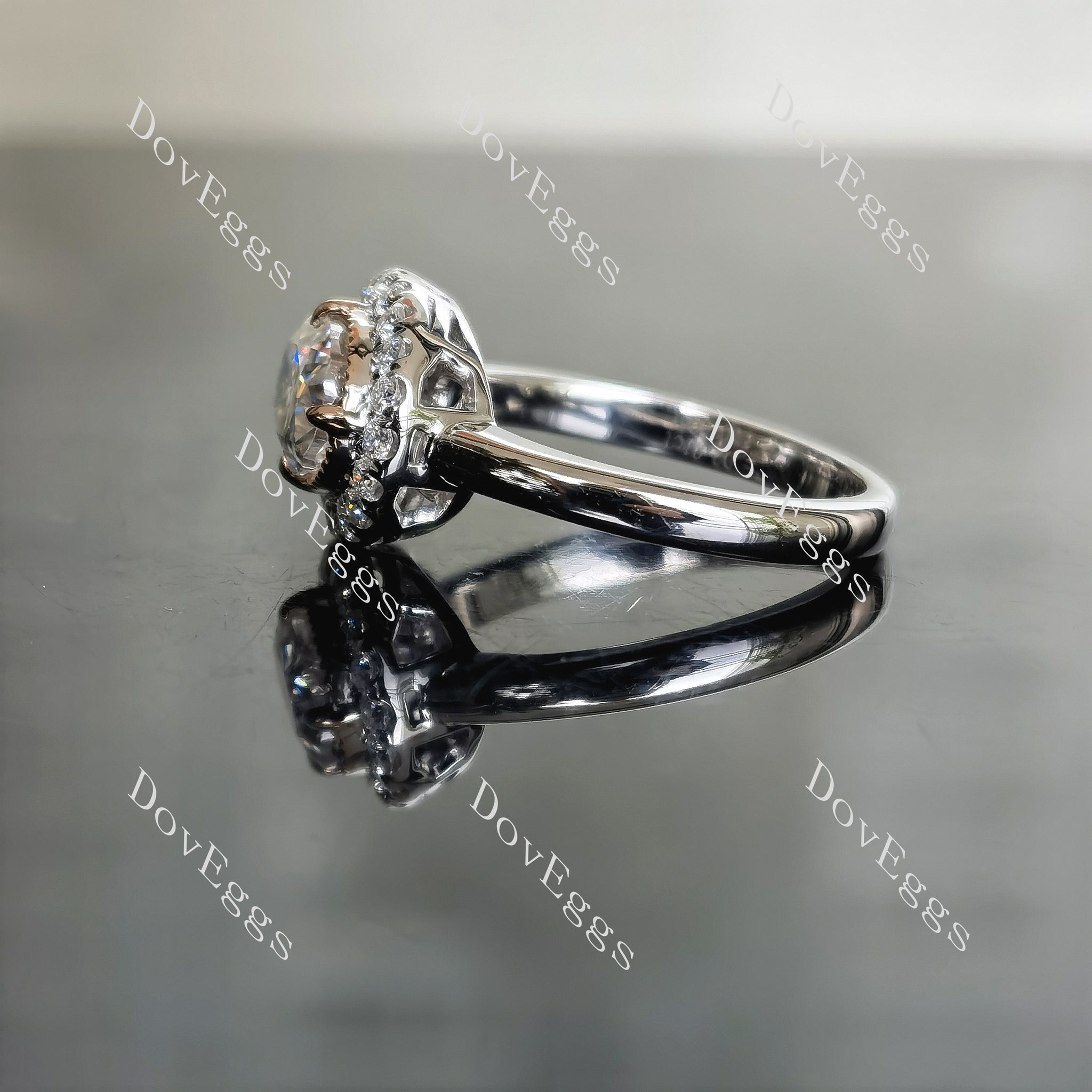 The SANDS oval halo moissanite engagement ring