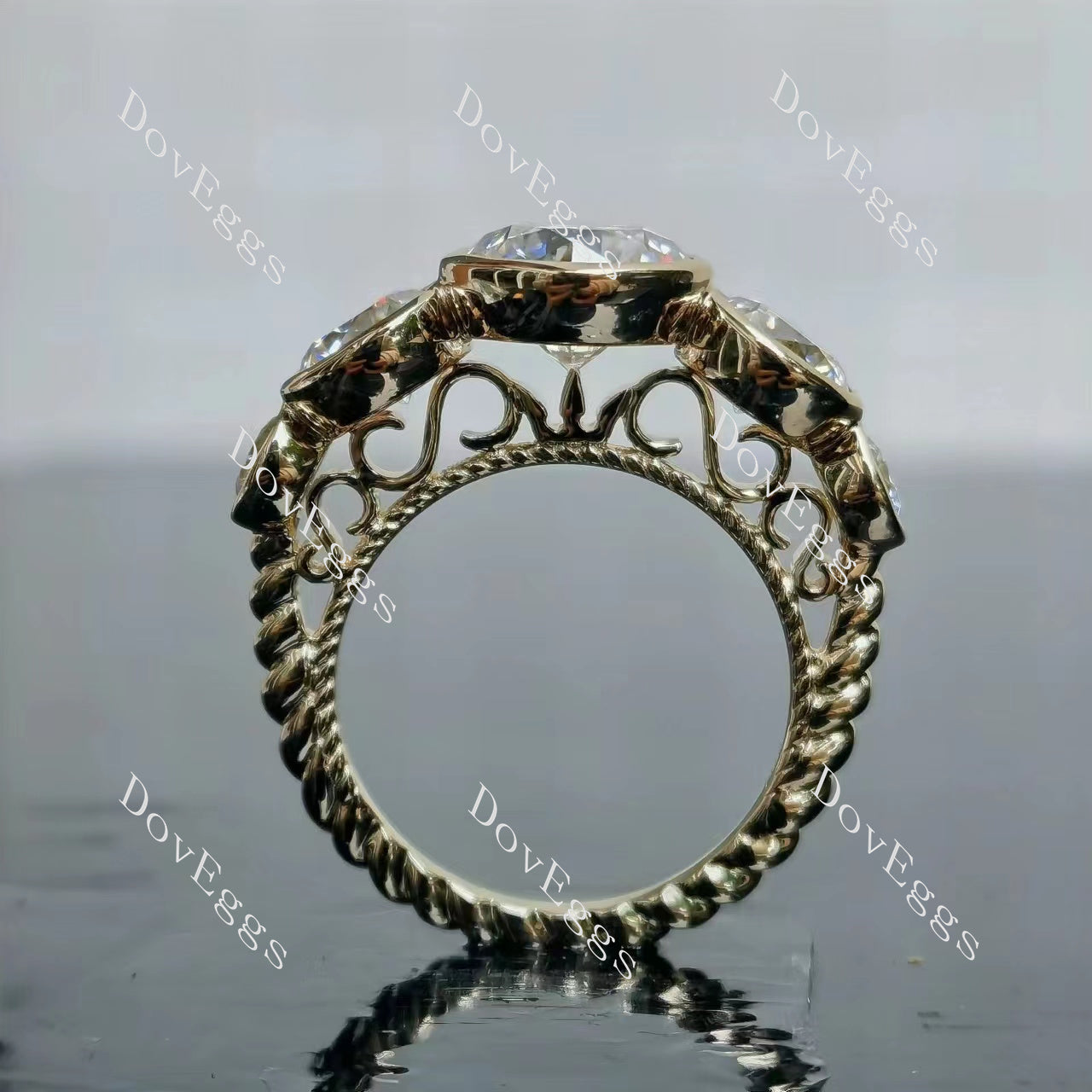 Tin's Mermaid Bubbles round bezel side stones moissanite engagement ring