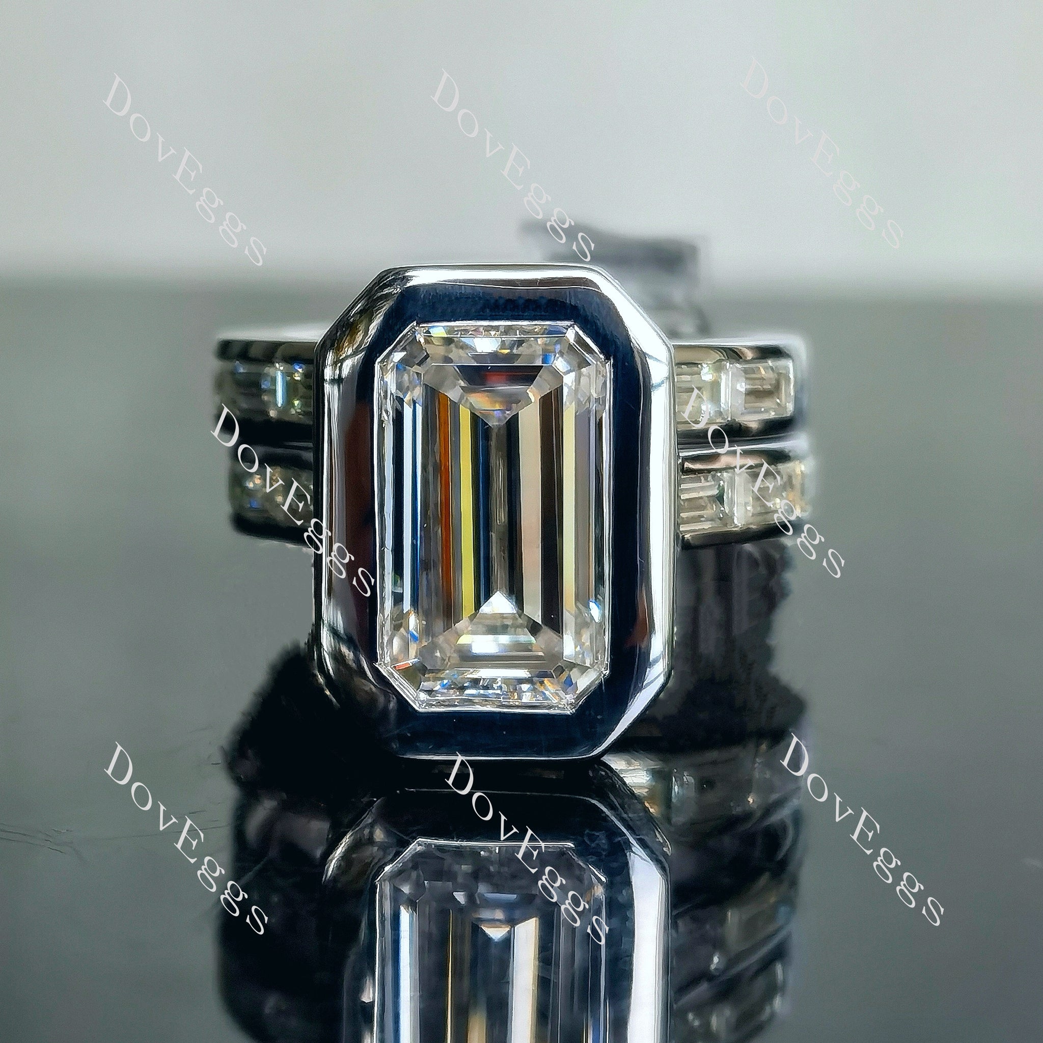 Doveggs elongated emerald bezel channel set moissanite bridal set (2 rings)