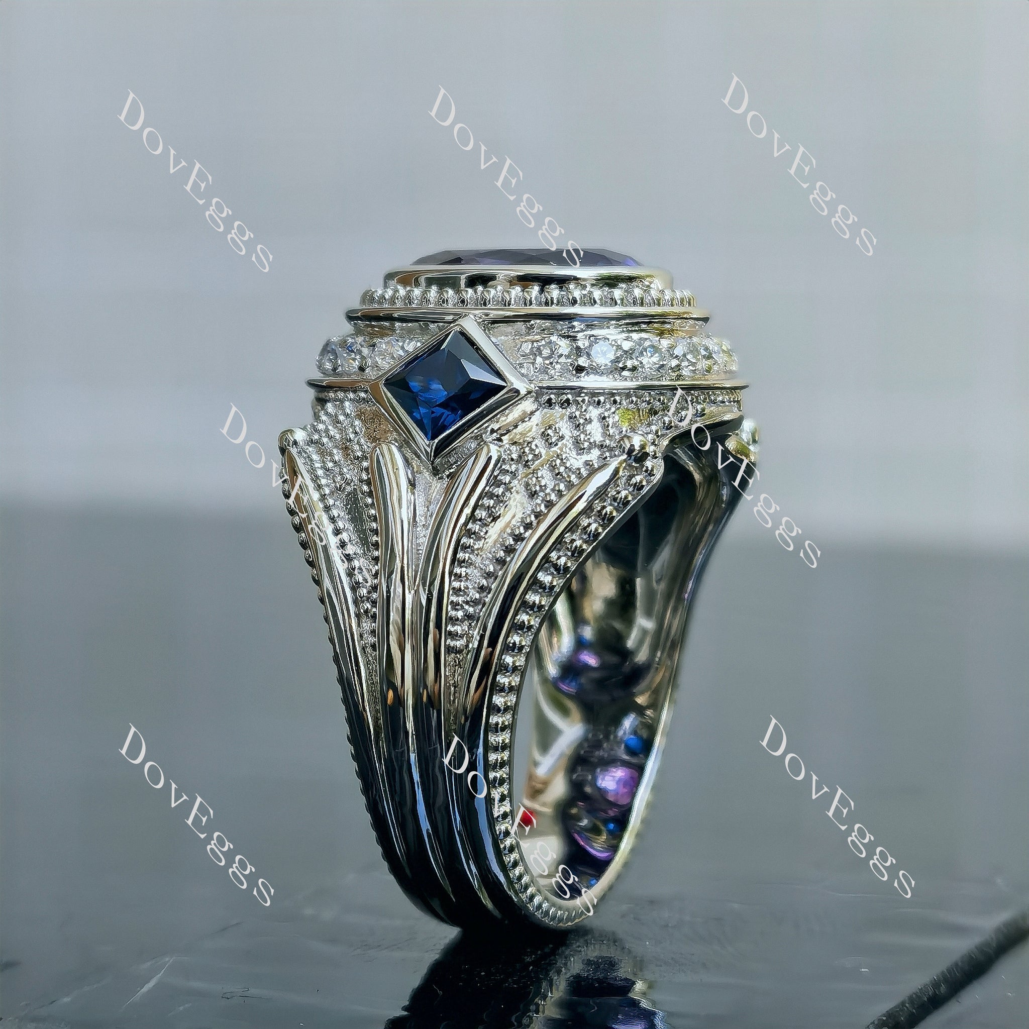 The Trinity oval bezel colored gem engagement ring