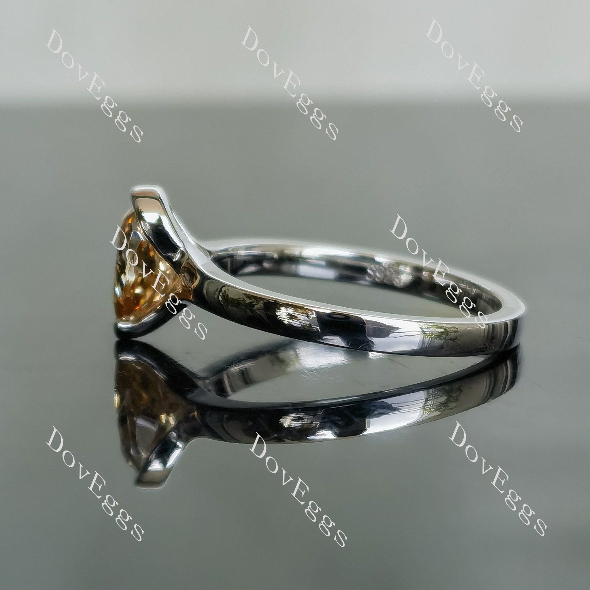 Kindal pear solitaire colored moissanite engagement ring