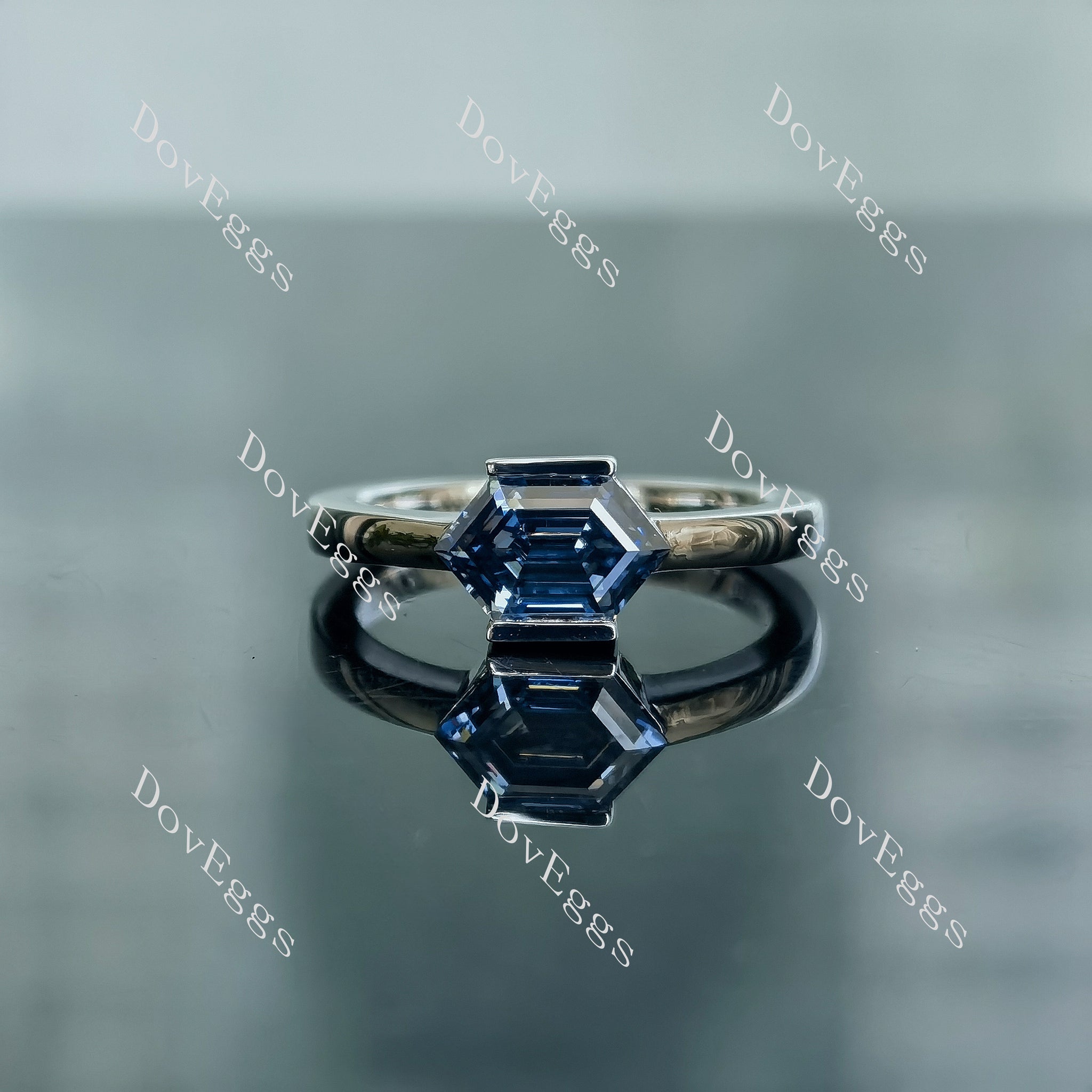 Dovie Doutch Marquise cut bezel solitaire twilight blue moissanite