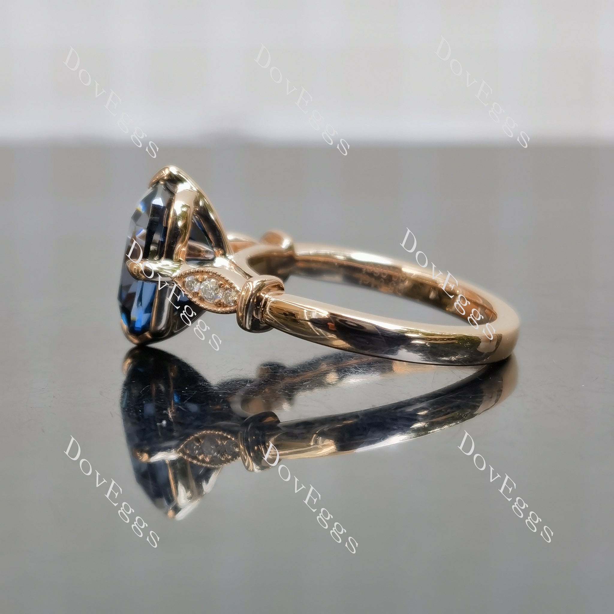 Twilight Dreams cushion side stones twilight blue moissanite engagement ring