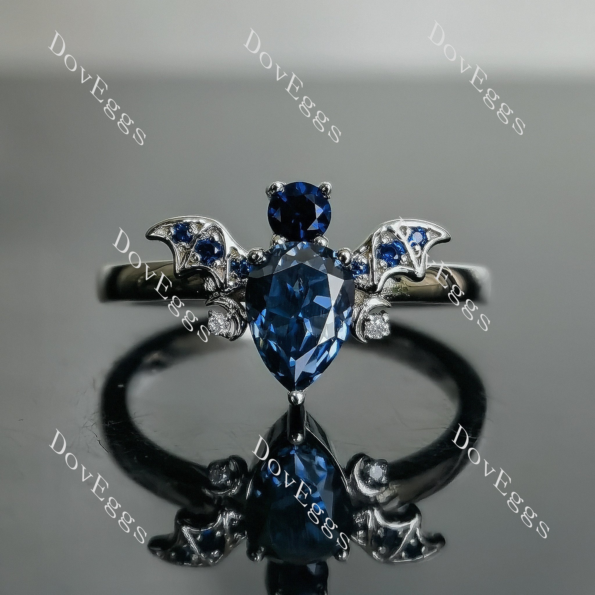 Doveggs pear bat twilight blue moissanite engagement ring