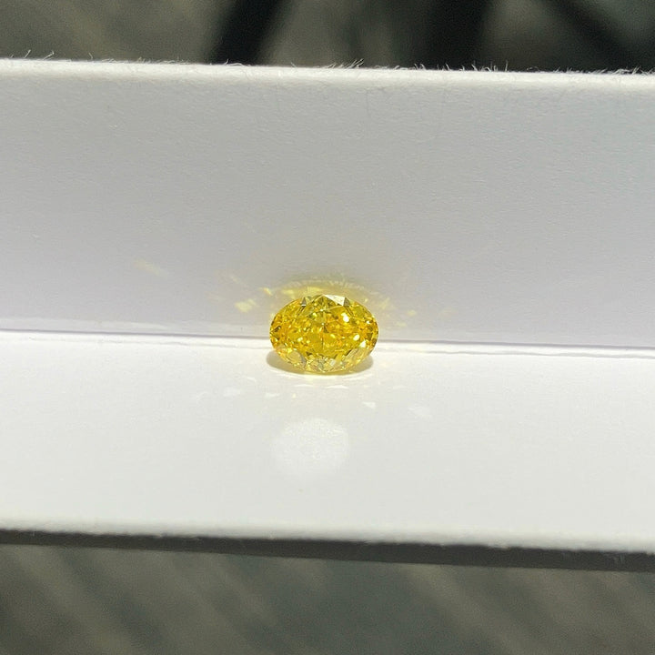 DovEggs 0.78ct oval fancy vivid yellow VVS2-LAB GROWN DIAMOND-EVD6206017464
