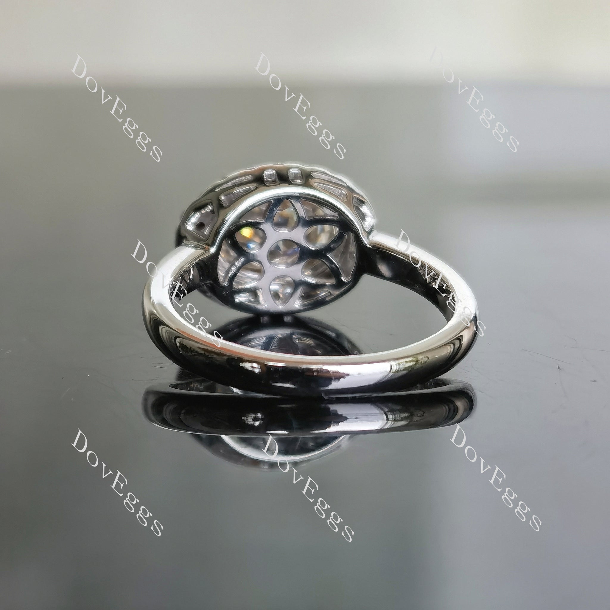 The SANDS oval halo moissanite engagement ring