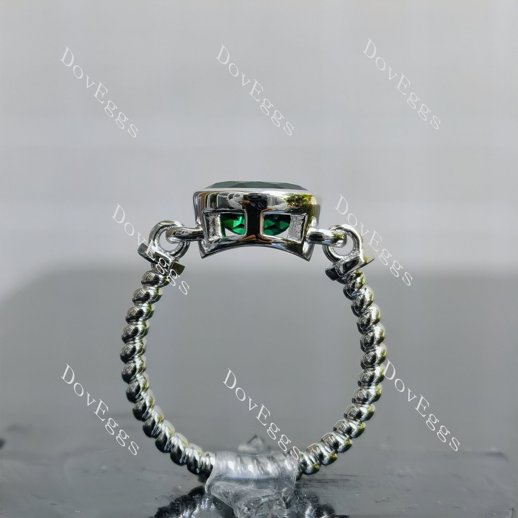 Doveggs oval solitaire bezel zambia emerald coclored gem engagement ring