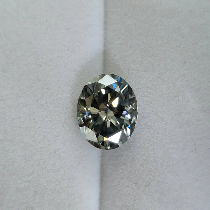 Oval Stardust grey moissanite loose stone with blue-grey tone