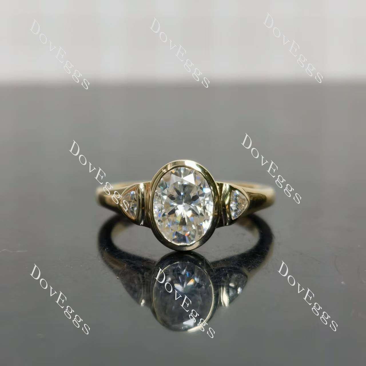 Oval bezel three stones moissanite engagement ring| Doveggs