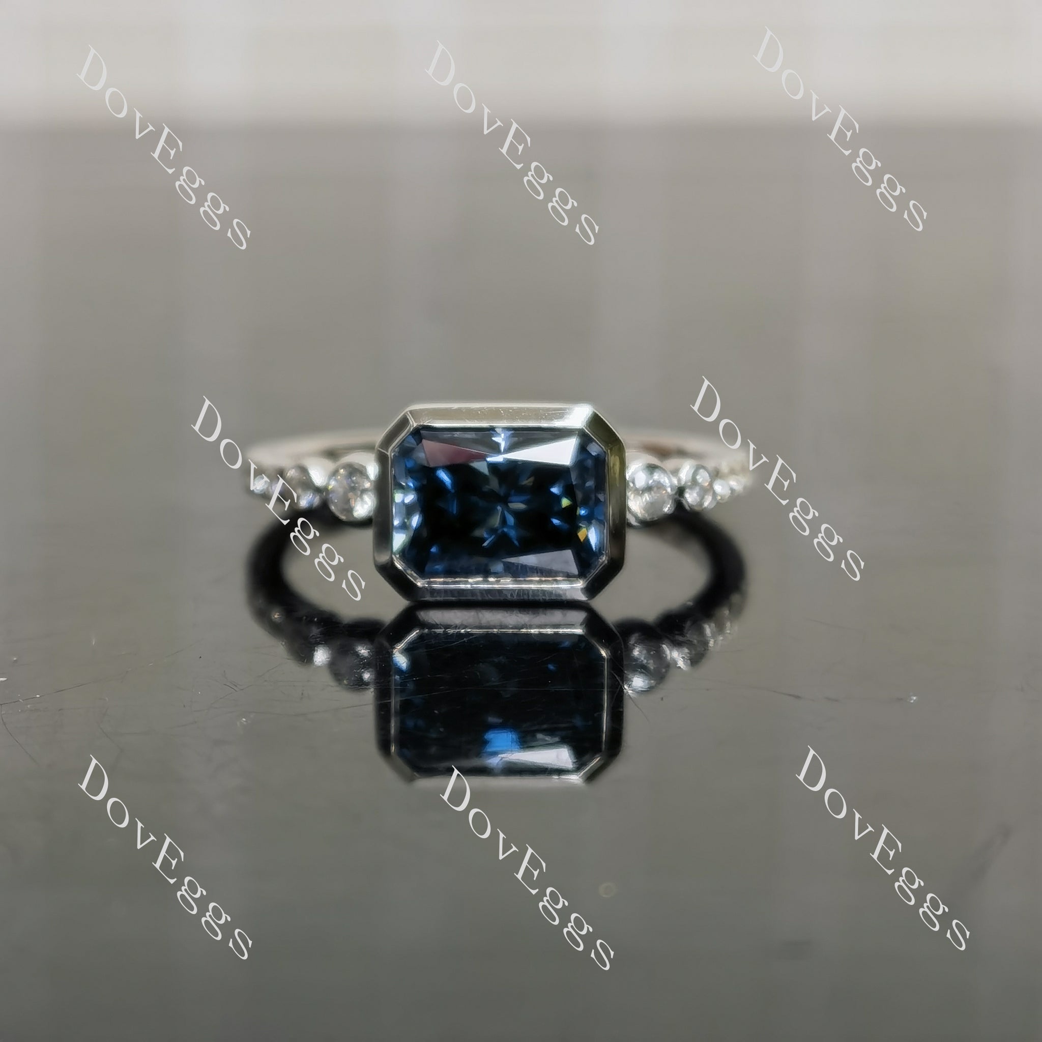 Radiant bezel twilight blue moissanite engagement ring front view|Doveggs