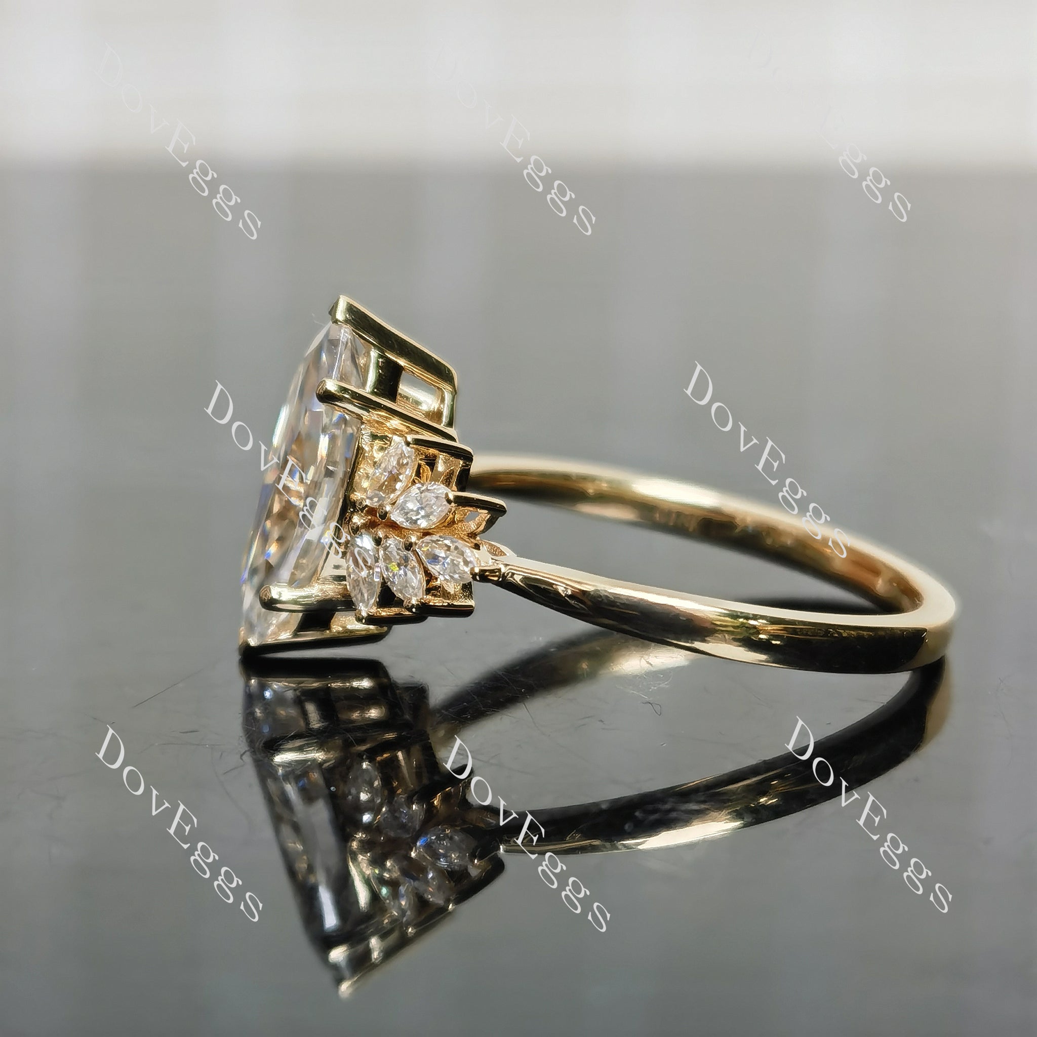 Close-Up of marquise moissanite and side stones engagement ring|Doveggs