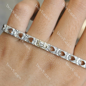 Doveggs bezel heart shaped hollow out heart moissanite bracelet model's on-hands view