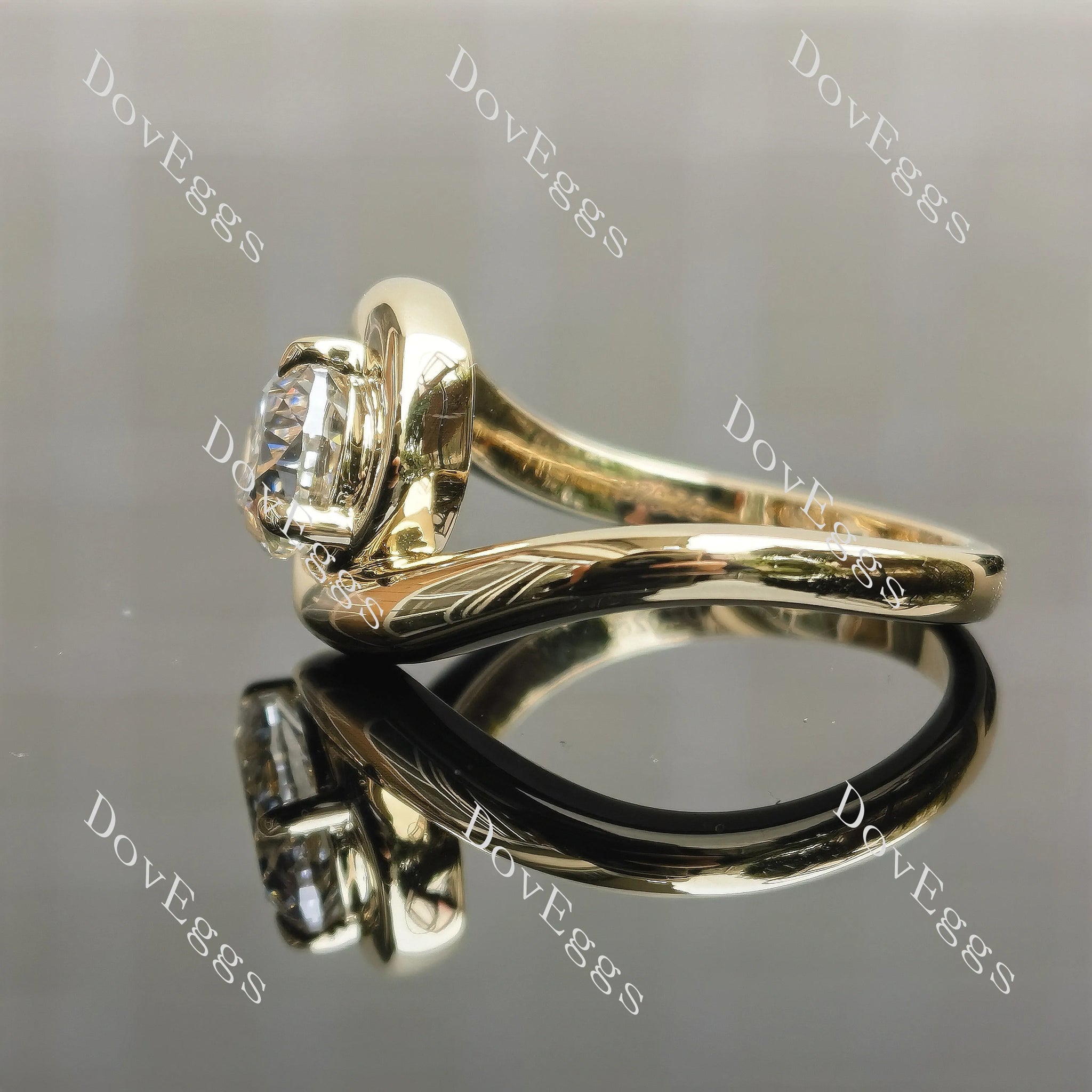 Yellow gold pear solitaire engagement ring