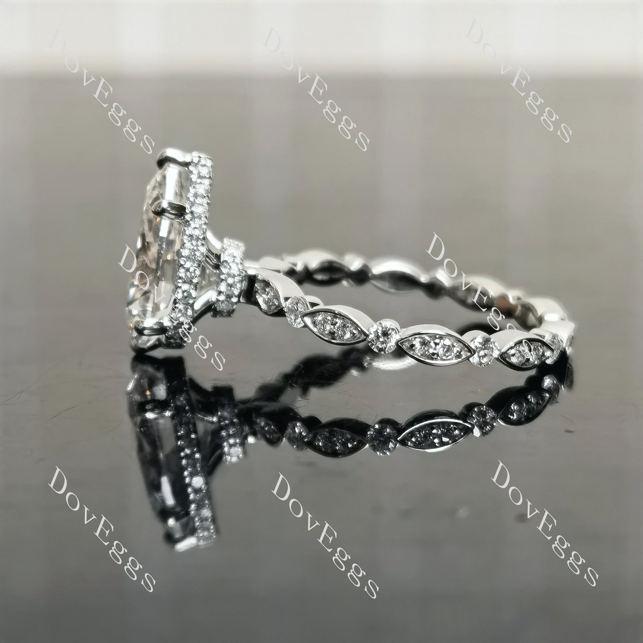 DovEggs pear pave hidden halo moissanite engagement ring