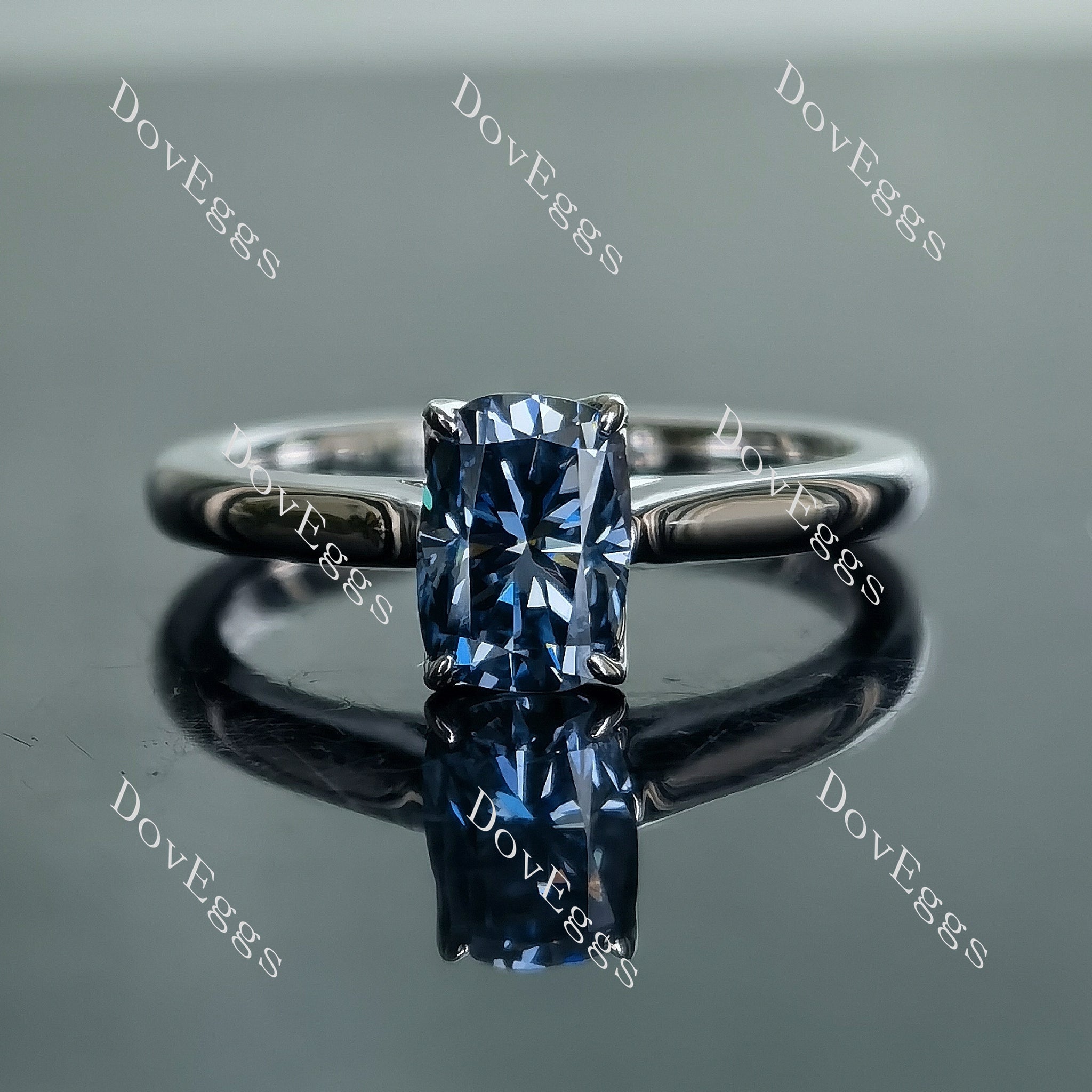 Simply Charming cushion solitaire twilight blue moissanite engagement ring