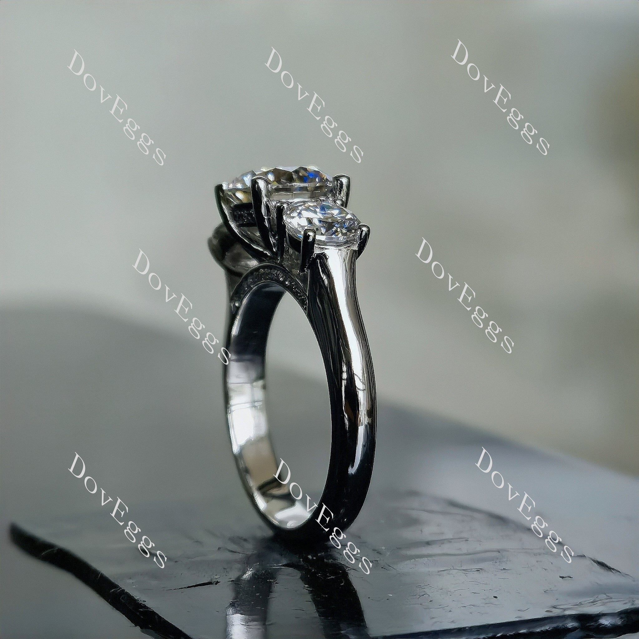 Doveggs round three-stone moissanite engagement ring