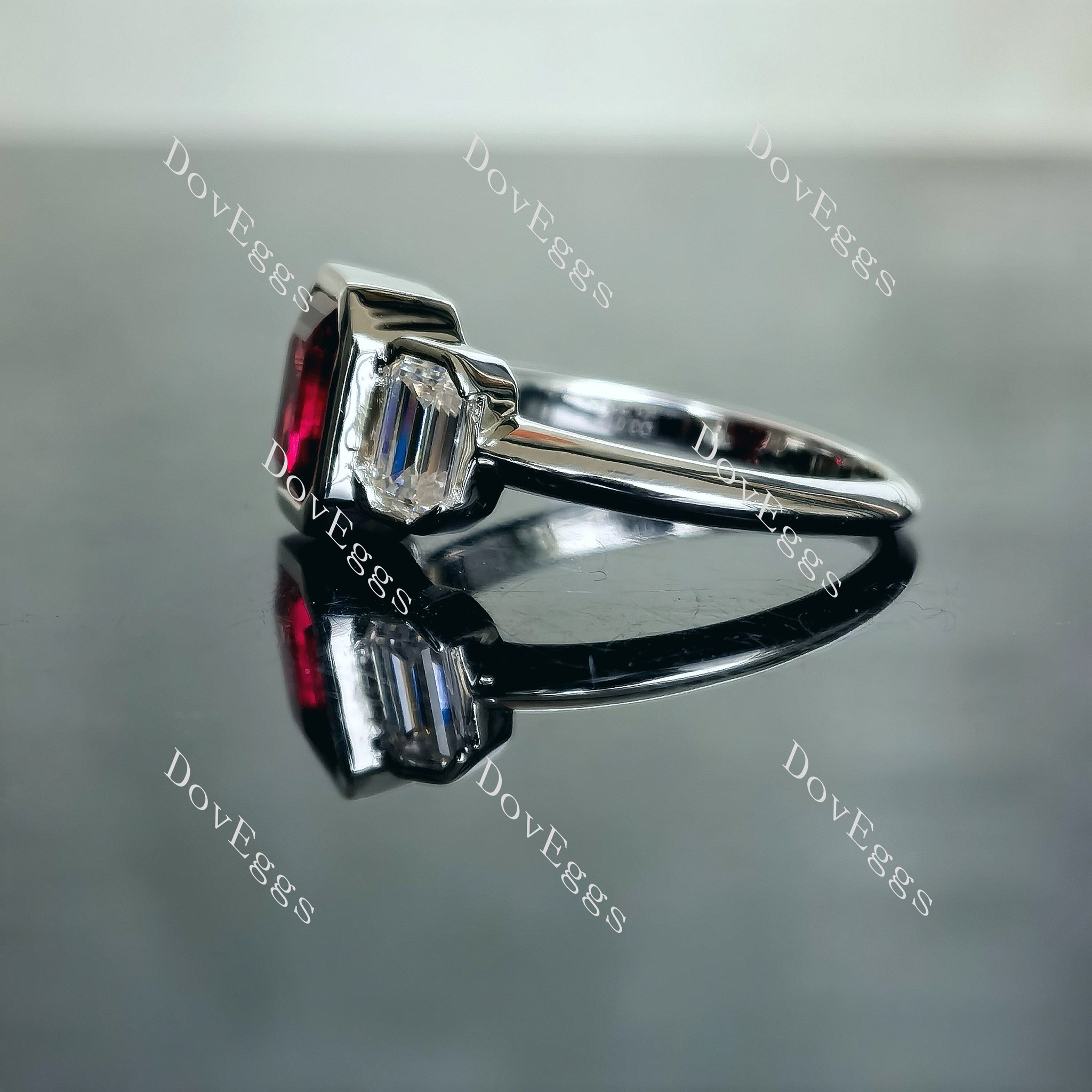 Doveggs Elizabeth Taylor Krupp cut three stone bezel colored gem engagement ring
