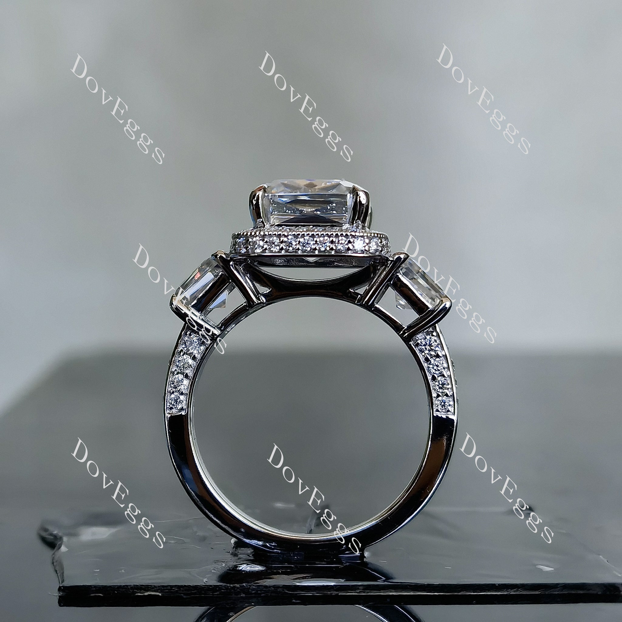 The Aunt Gabby three stone halo criss cut moissanite engagement ring