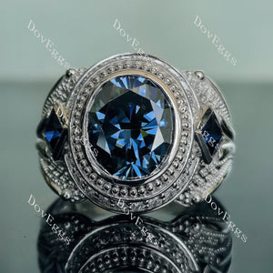 The Trinity oval bezel twilight blue moissanite engagement ring
