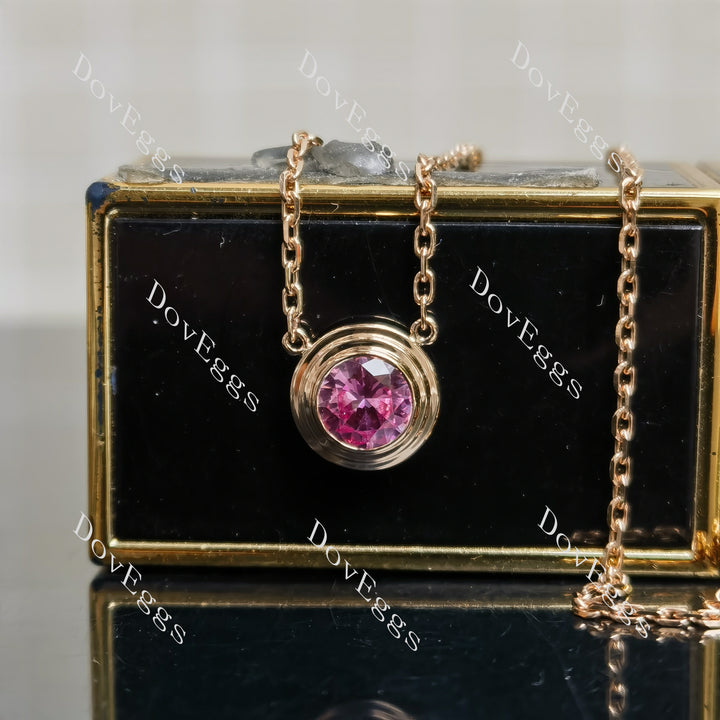 round bezel colored gem