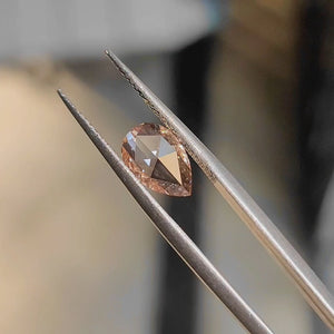 Golden hour video capturing 1.53ct-Pear pear rose cut's pink reflections
