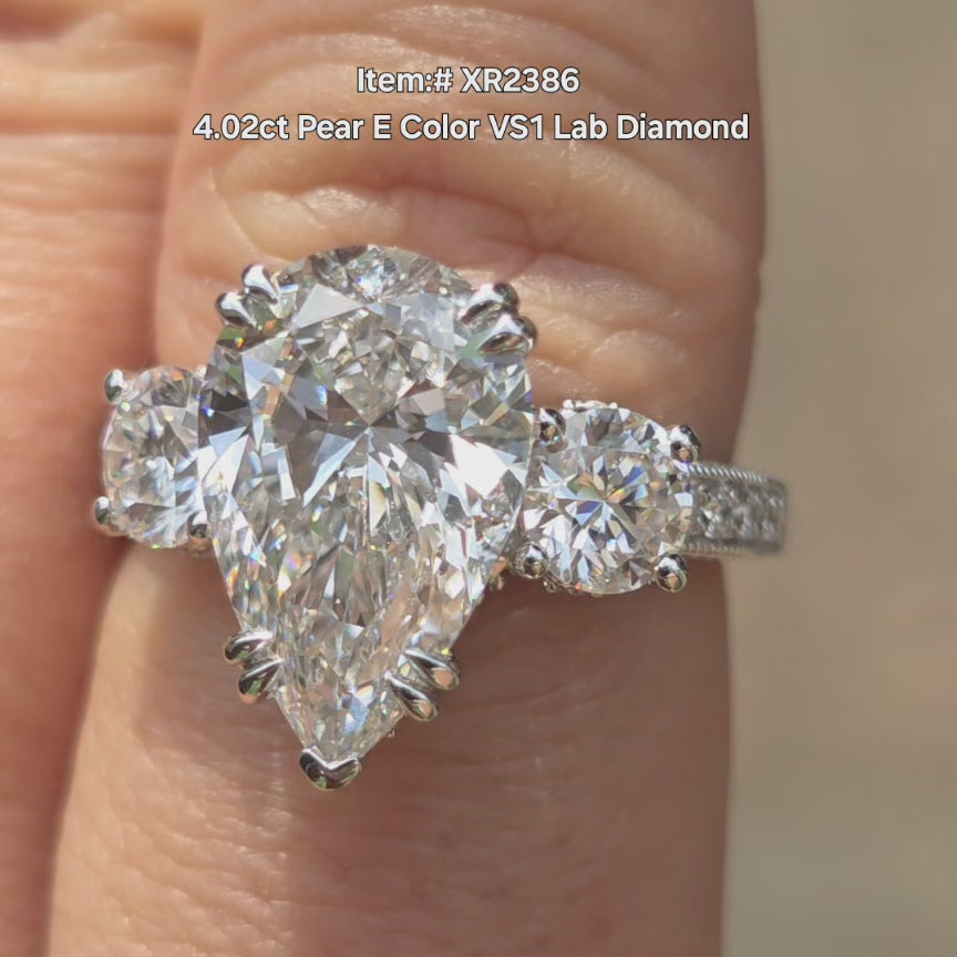 Doveggs pear shape three stones lab grown diamond engagement ring