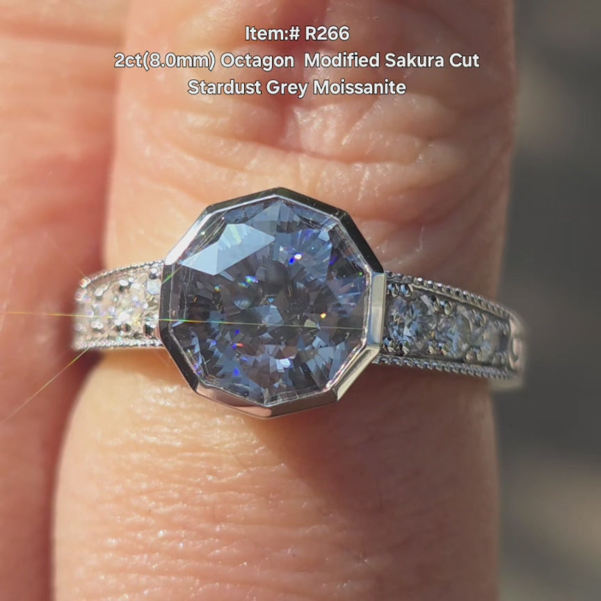 DovEggs Octagon Modified Sakura Cut Stardust Grey moissanite engagement ring