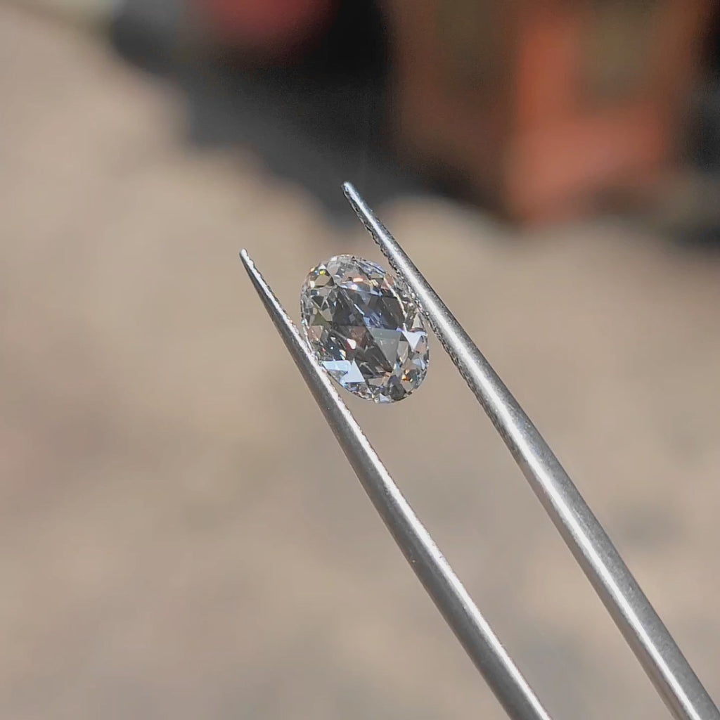 2.009ct Oval Rose Cut diamond’s unique faceting under sunlight