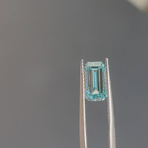 "Sunlit video of 3.03ct emerald cut's aquamarine-like color and hall-of-mirrors effect"