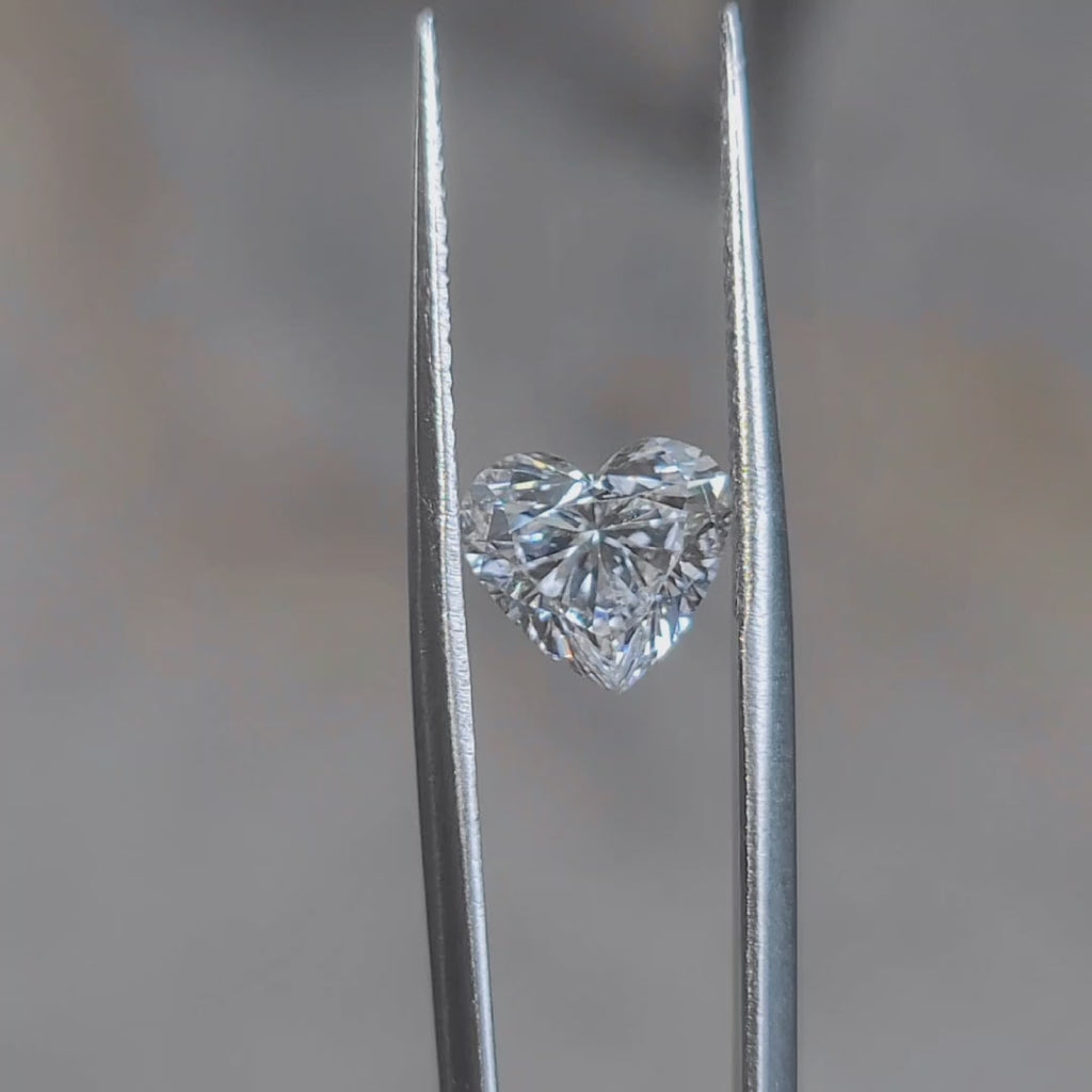 Romantic lighting video of 2.510ct heart cut's perfect symmetry
