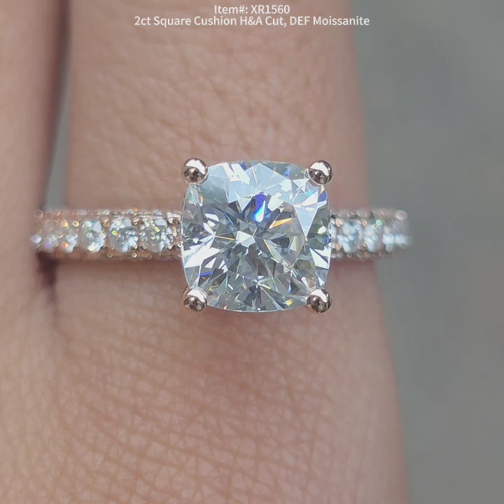 DovEggs 2ct square cushion H&A cut moissanite ring with pave setting band for women.