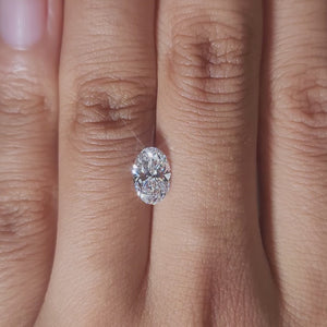 Hand-worn video of 1.03ct oval diamond in soft incandescent light