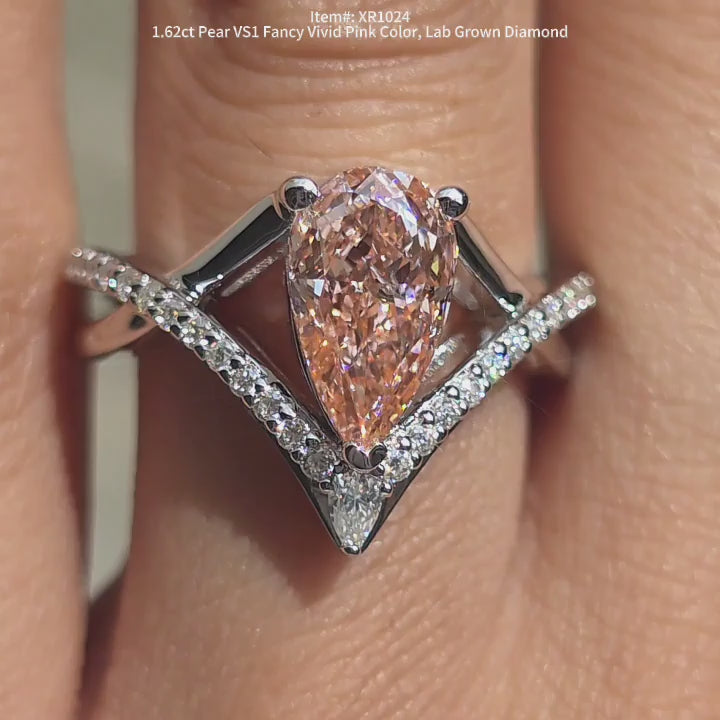 DovEggs Pear Fancy vivid pink lab grown diamond ring | pave engagement ring for women.