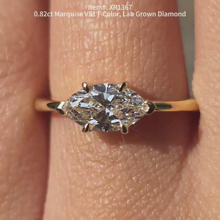 DovEggs Marquise lab diamond engagement ring sparkling in sunlight video.