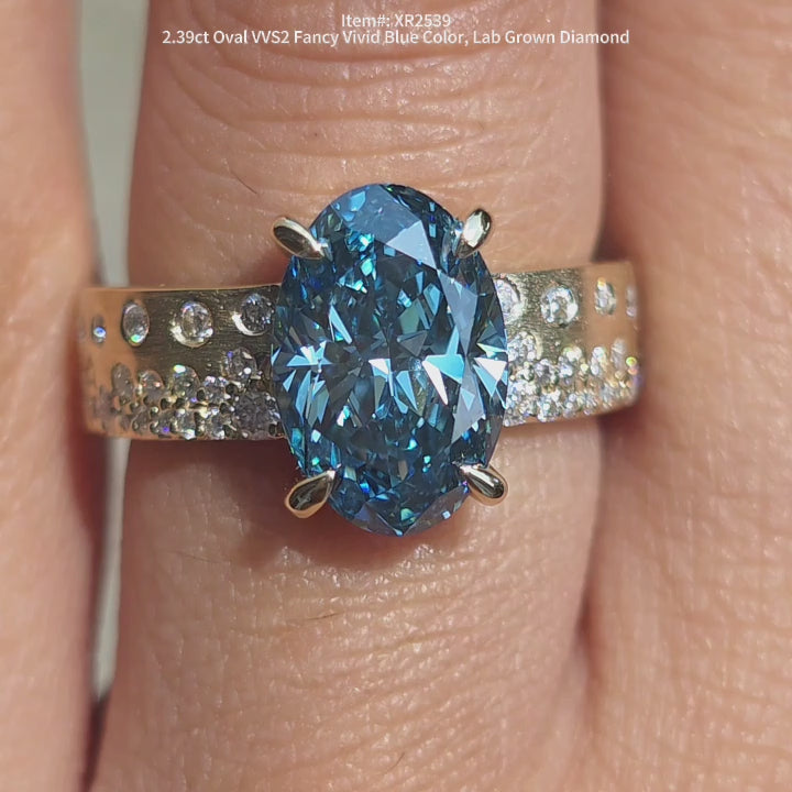 DovEggs art deco pave 2.39ct oval blue lab diamond engagement ring video in sunlight