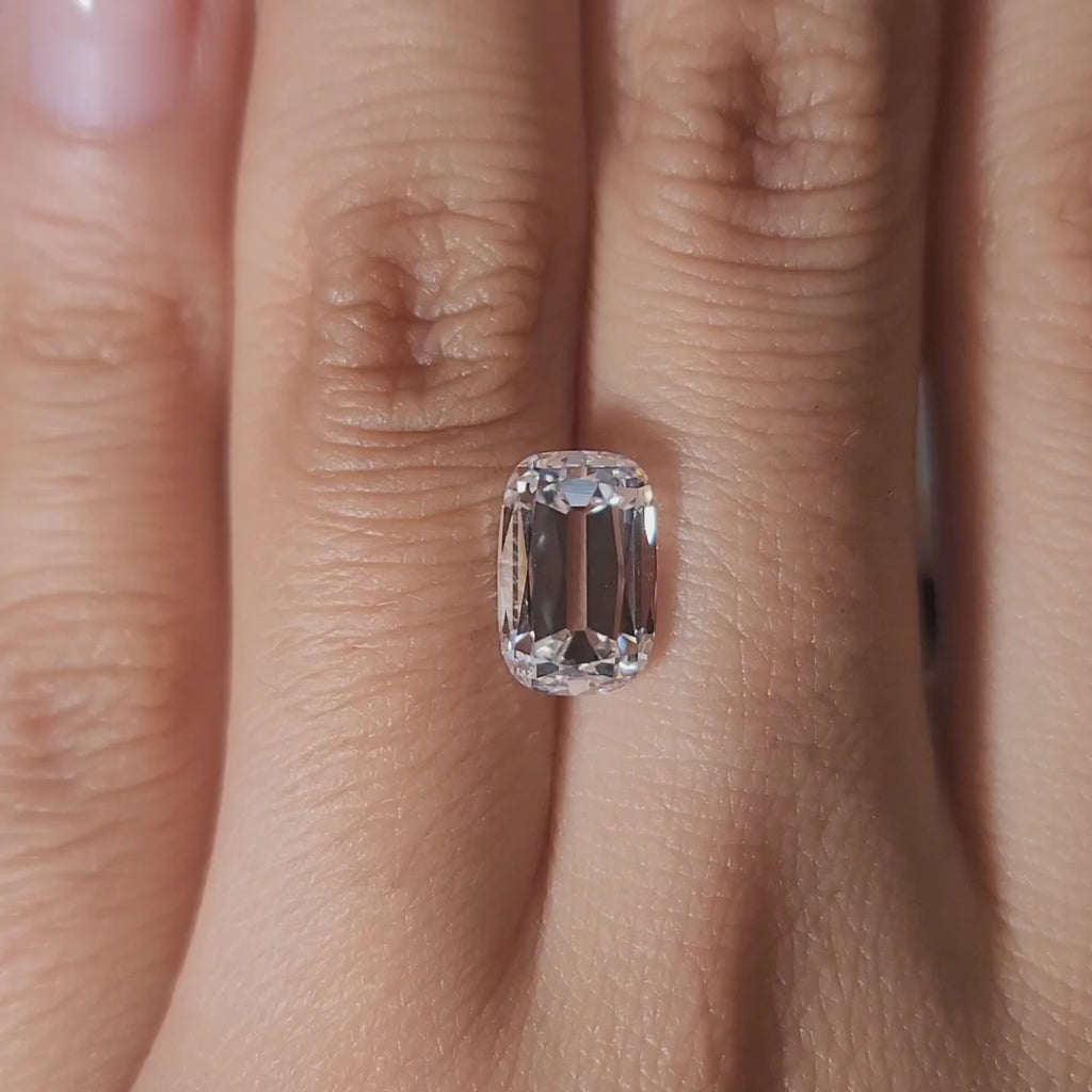 Three-stone vintage ring video of 3.01ct old mine diamond