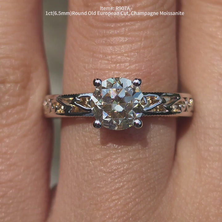 DovEggs 1ct Round Old european cut  moissanite ring | Champagne moissanite engagement ring sparkling in sunlight video.