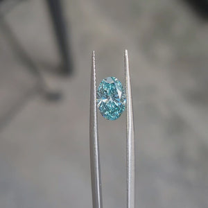 1.608ct oval cut vivid blue diamond's color intensity in sunlight