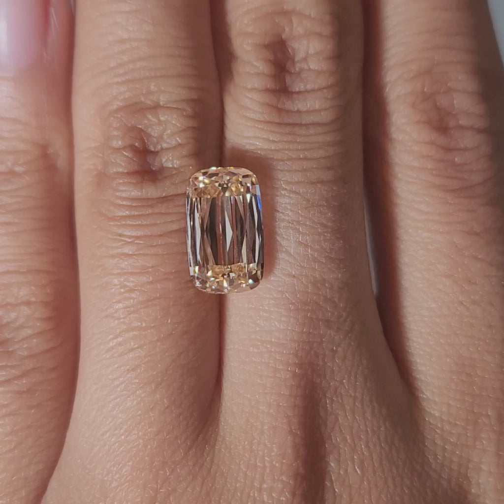 Close-up video of 4.55ct orange cushion diamond facets