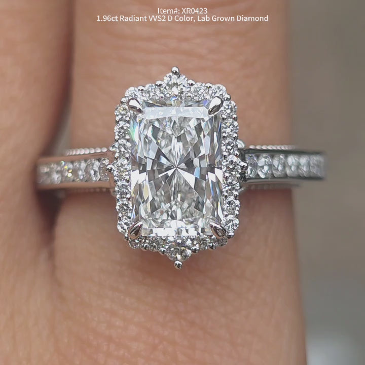 DovEggs 1.96ct Radiant cut WS2 D color lab grown diamond ring sparkling in natural lighting video.