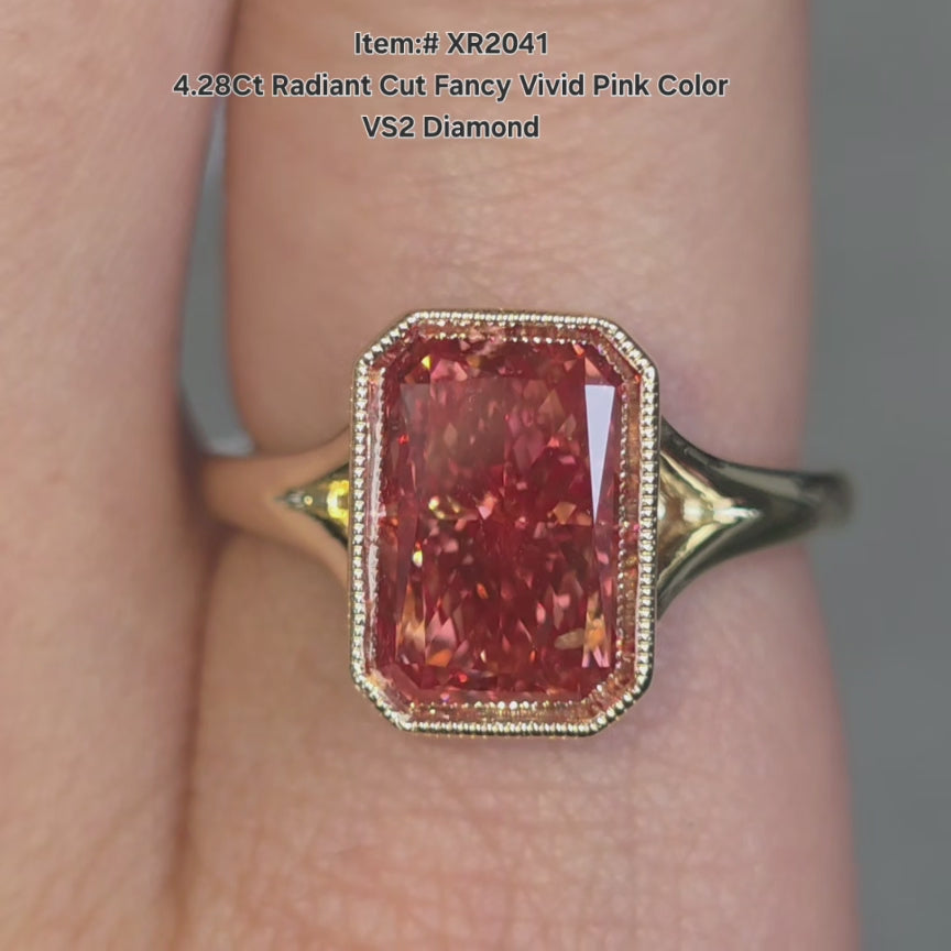 DovEggs radiant fancy vivid pink diamond ring sparkling in natural light video